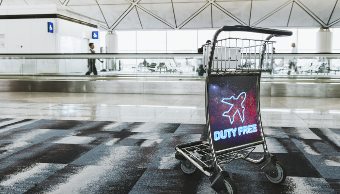 publicidad Duty free en carro equipaje aeropuerto