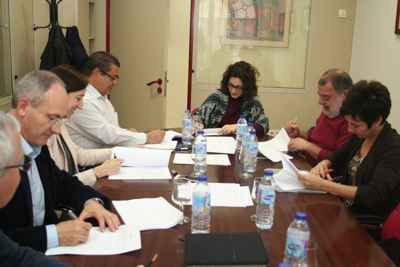 firmando el convenio de oficinas y despachos de Málaga